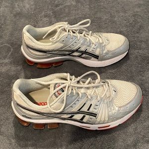 Asic Gel Kinsei 11.5, Men’s, White with black stripes and red sole.